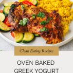 A plate with oven-baked Greek yogurt chicken thighs garnished with herbs, served with yellow rice and sautéed zucchini and red bell peppers. Text overlay reads: “Oven Baked Greek Yogurt Chicken.”.