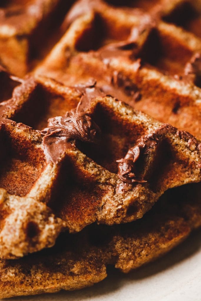 stack of waffles with Nutella on top