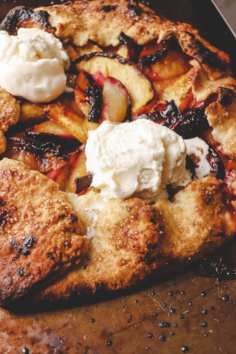 stone fruit galette with vanilla ice cream on top