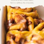 pinterest pin for pumpkin cinnamon rolls with apple pie filling