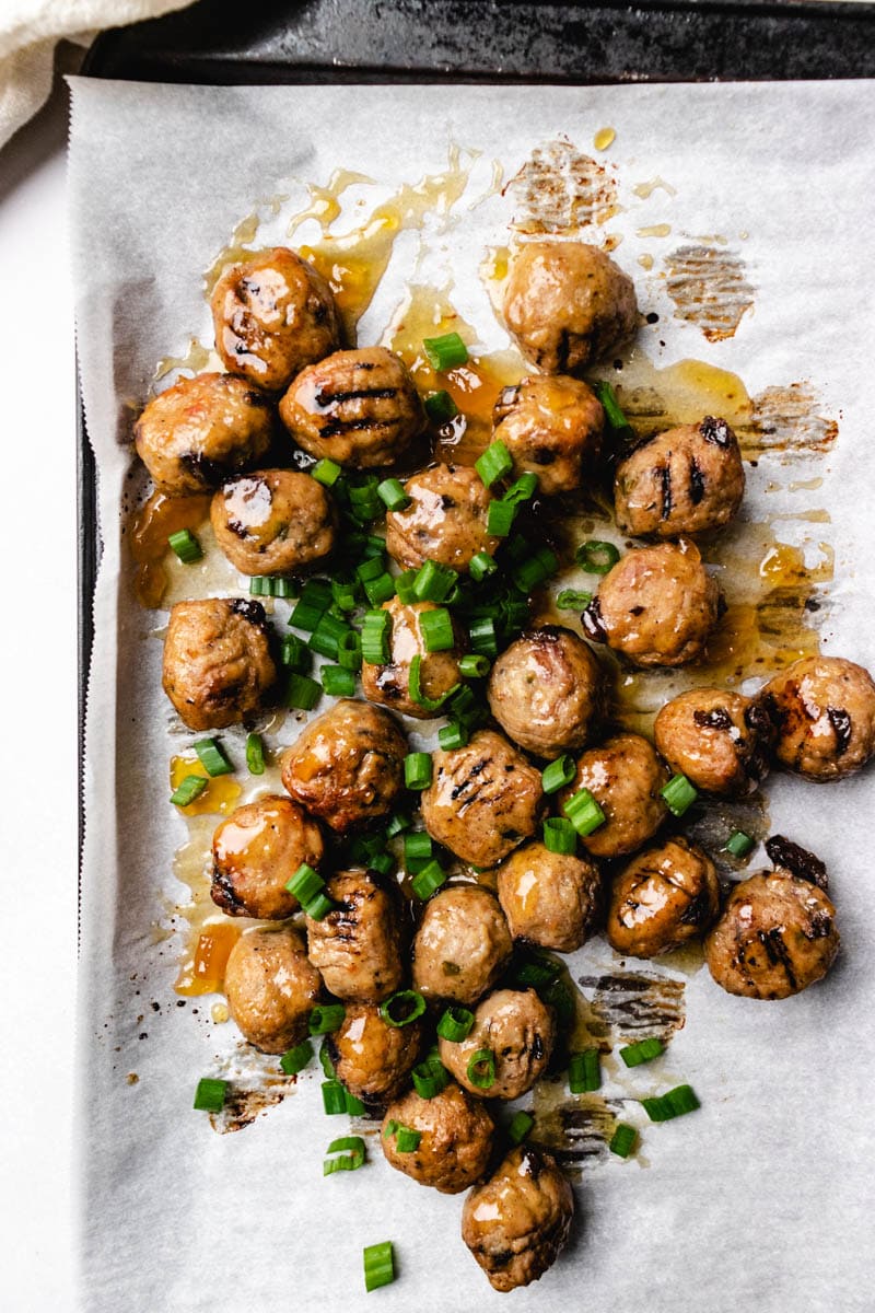 sauce on top of the meatballs