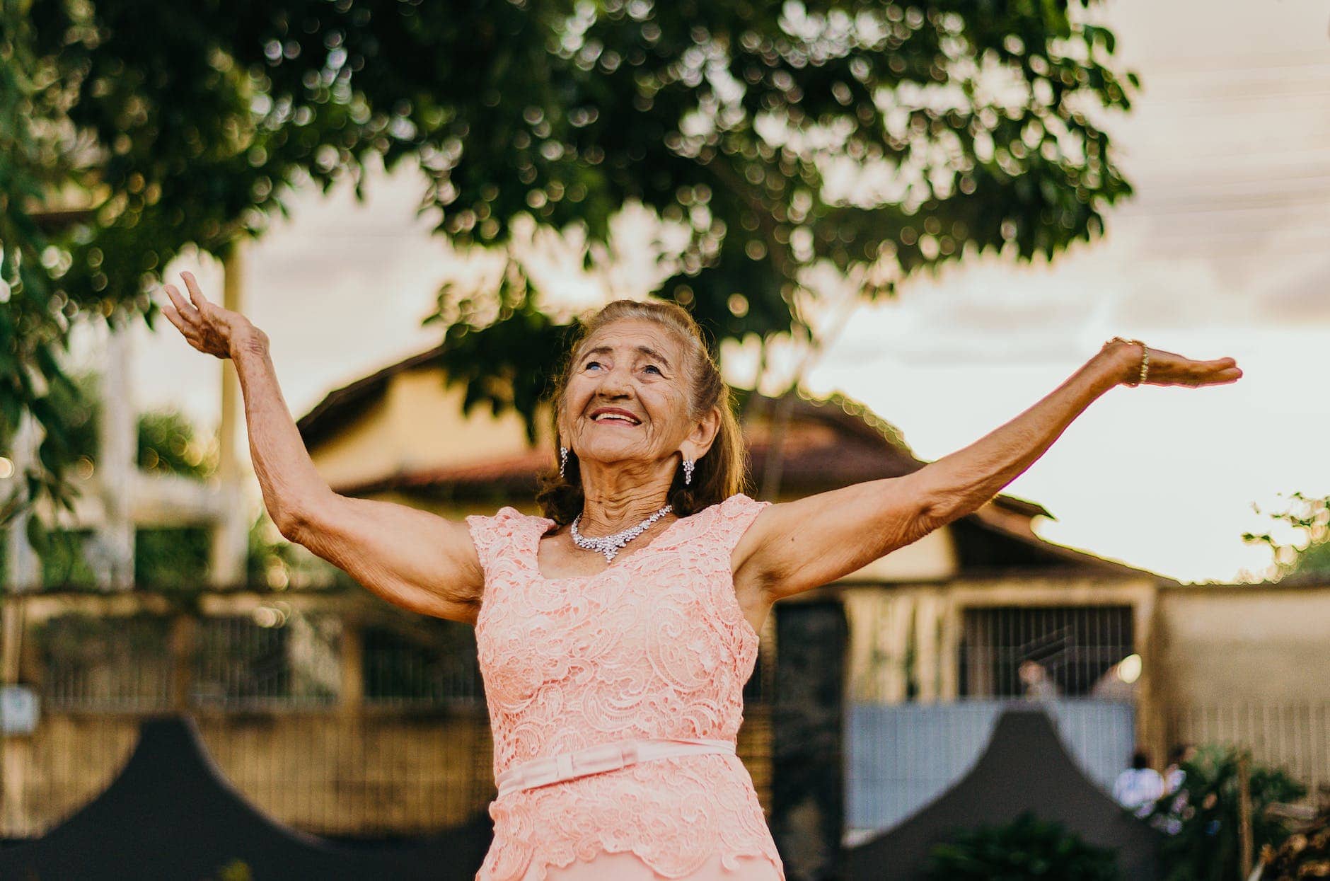 woman raising her both hands