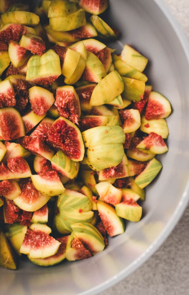 fresh figs cut up in a pan