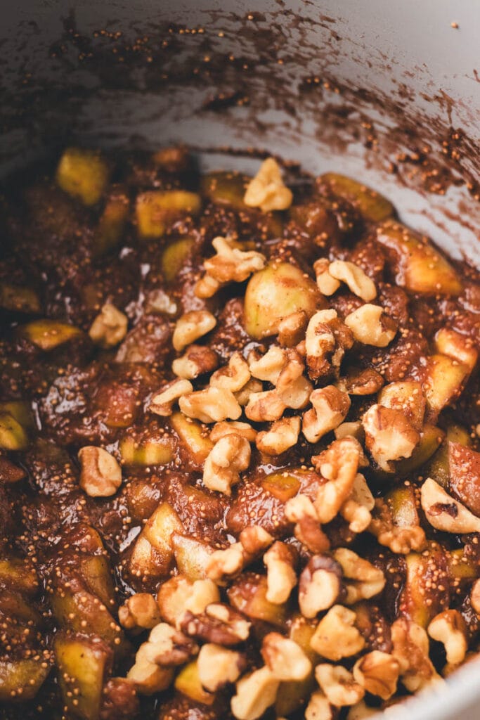 adding walnuts to the fig mixture