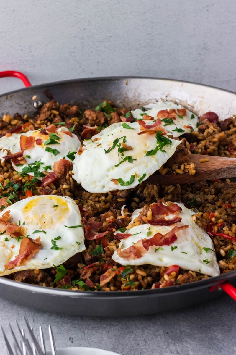 breakfast paella in a paella pan.
