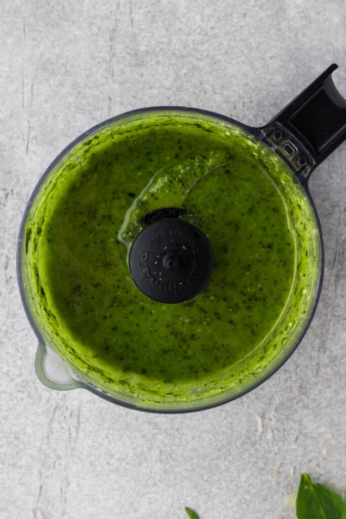 Fresh pesto in a food processor.