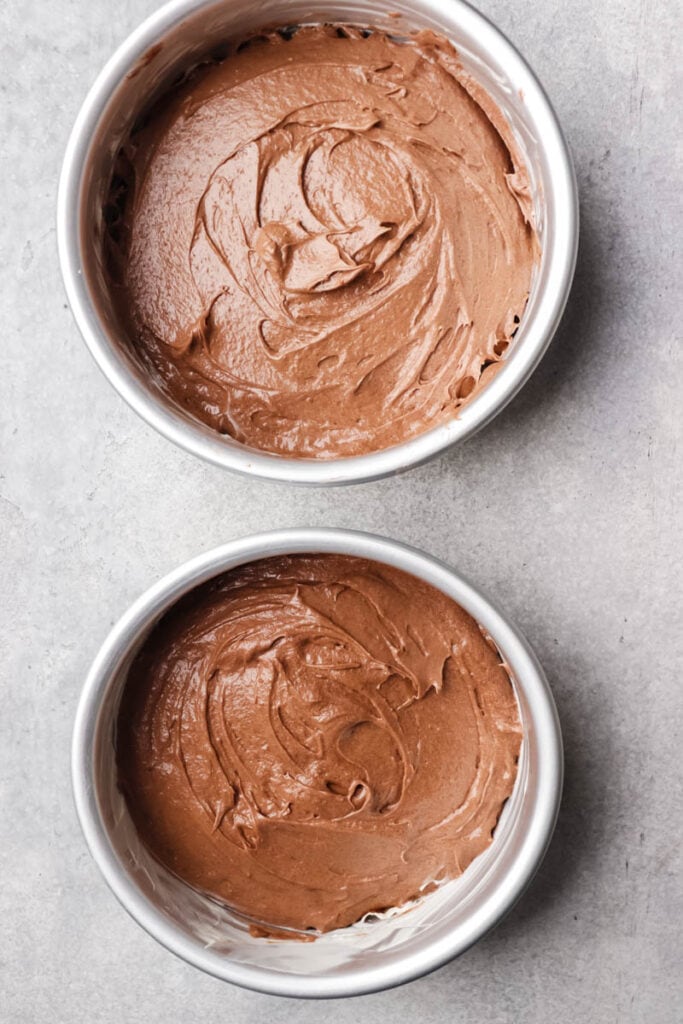 cake batter in the cake pans.
