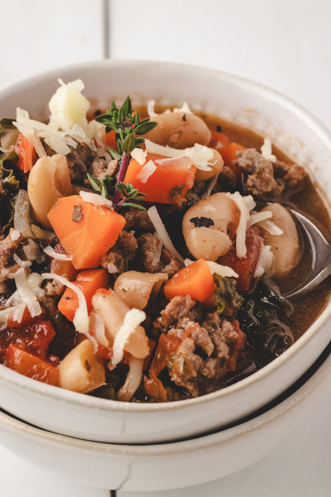 close up picture of Italian Beef Soup with White Beans.
