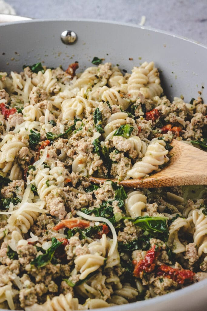 close up shot of Ground Turkey Pesto Pasta with Kale.
