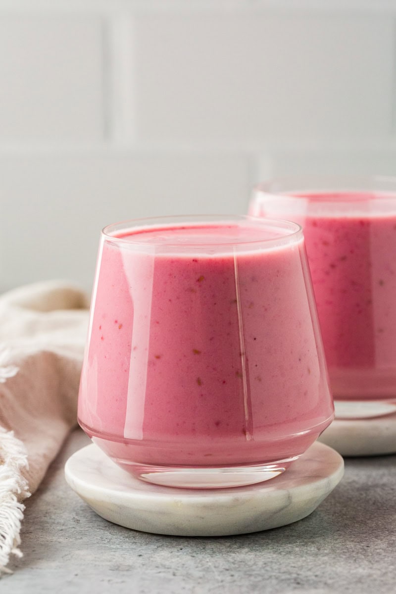 raspberry Greek yogurt smoothies in short glasses.