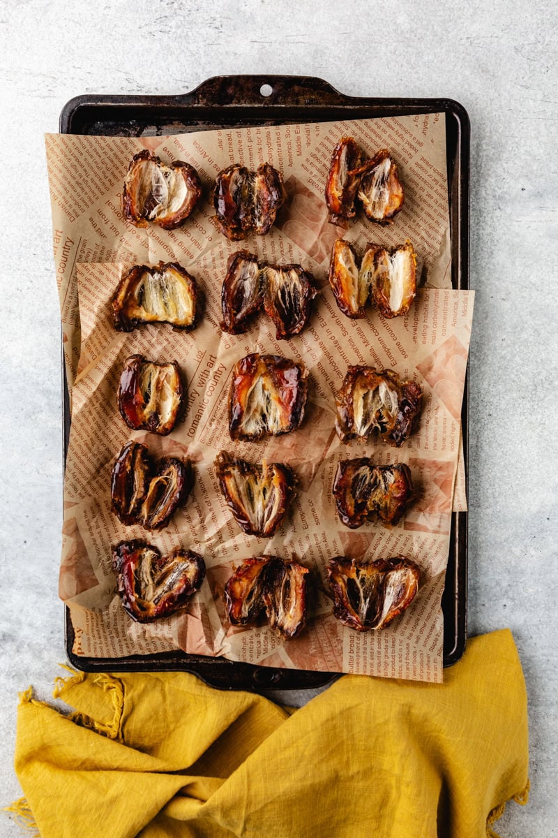 dates on a baking sheet.