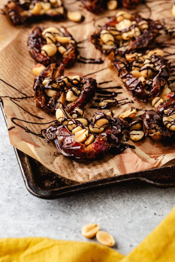 close up picture of the dessert dates on a sheet pan.