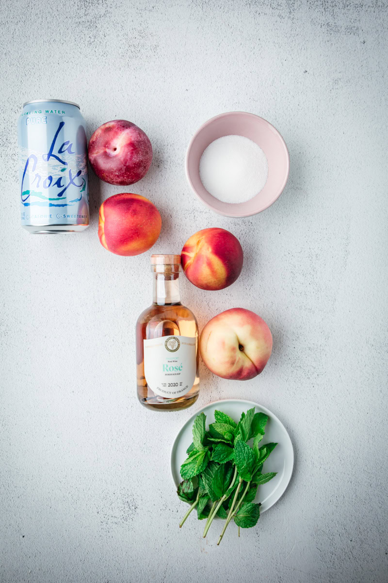Ingredients for Sparkling Nectarine Sangria with Peaches and Plums.