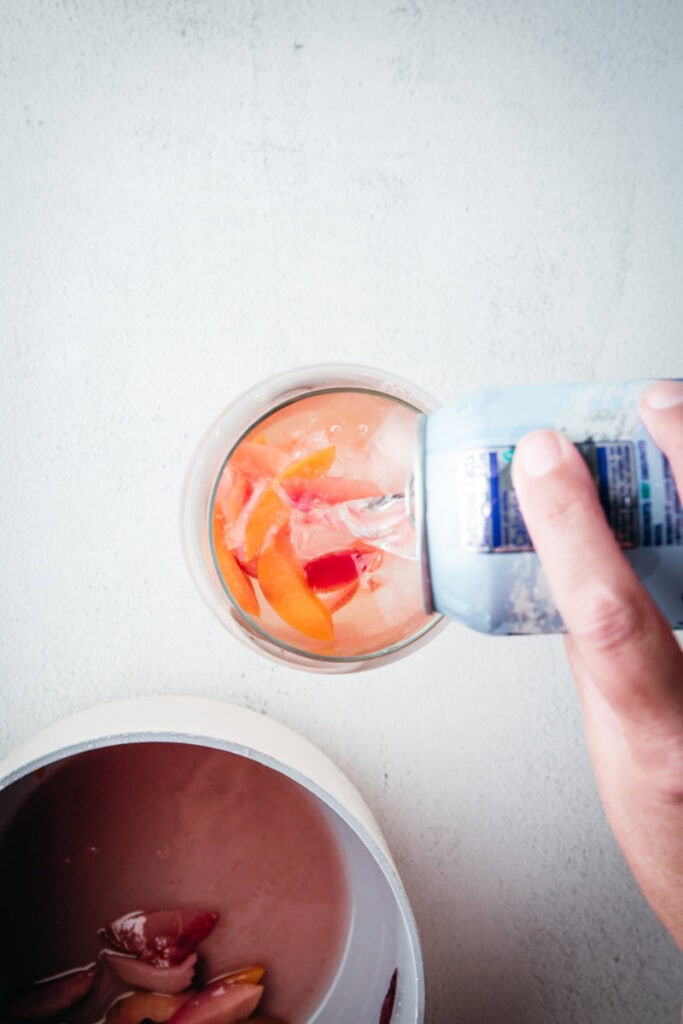 pouring in sparkling water