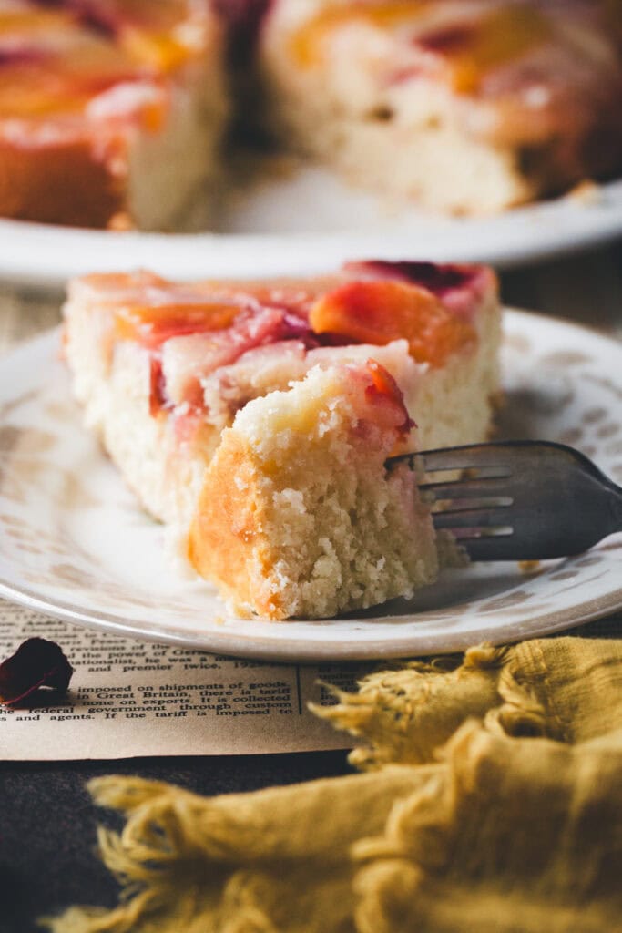 a bite of Stone Fruit Upside Down Cake.
