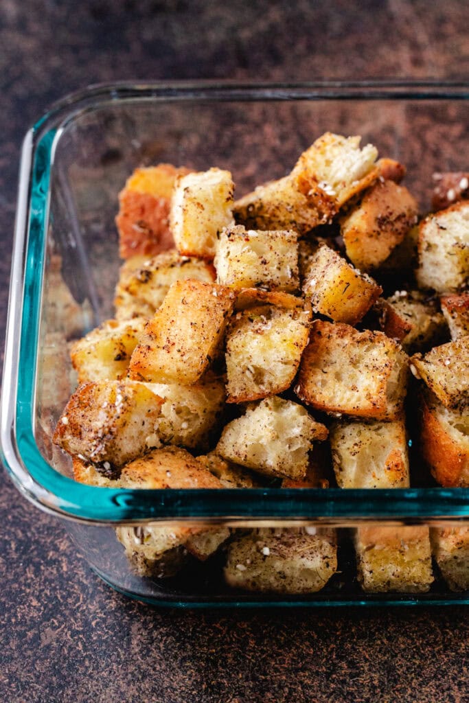 croutons in a glass storage dish