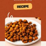 A white plate of turmeric roasted chickpeas sits against a brown backdrop. The text above announces Turmeric Roasted Chickpeas Recipe, leading you to whensaltyandsweetunite.com. An arrow guides your eye to these golden, spiced delights.
