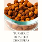 A sleek glass bowl brimming with turmeric roasted chickpeas rests on a pristine white surface. The text reads, Discover Delicious Turmeric Roasted Chickpeas - Healthy Snack Ideas, with a website link below.