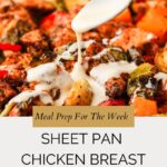 Close-up of a spoon drizzling white sauce over sheet pan chicken breast and colorful mixed vegetables. Text reads Meal Prep For The Week: Sheet Pan Chicken Breast With Veggies.