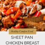 A close-up of a spoon lifting juicy sheet pan chicken breast and colorful vegetables, drizzled with a creamy sauce. Text reads: Healthy Comfort Food - Sheet Pan Chicken Breast with Veggies.