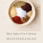 A bowl filled with assorted spices, including salt, pepper, dried herbs, and paprika, sits on a light surface. Text below reads: “Best Spices For Chicken – Mediterranean Spice Mix.” Website link is shown at the bottom.