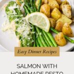 A plate of pesto salmon with a fork, ready to enjoy.