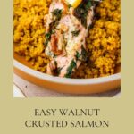 A plate of walnut-crusted salmon topped with a lemon slice is served on a bed of yellow quinoa. Text reads Easy Walnut Crusted Salmon and Heart Healthy Recipes with a website link at the bottom, highlighting this flavorful walnut crusted salmon as a delicious and nutritious choice.